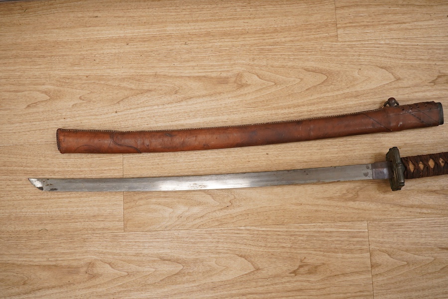 A Japanese WWII Shin gunto (sword) and leather mounted scabbard